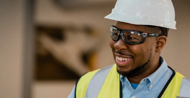 A smiling Rainbow Restoration service professional.