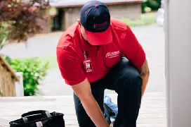 RBW tech putting on shoe covers.